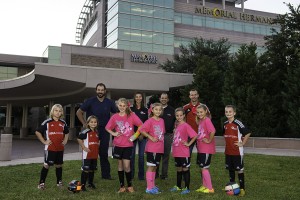 Dr. Michael Kent (Richmond Bone and Joint), Kim Vinson (Eclipse Soccer club), Steven Ramirez (Memorial Hermann Sugar Land) and Paul Rossetti (Eclipse Soccer Club). Front row, from left: Nicholas Sanders, Joshua Sanders, Lauren Vinson, Taylor Vinson, Kara Canetti, Morgan Vinson, and Owen Rossetti